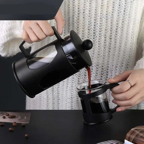 350ml glass French press pouring brewed coffee into a cup